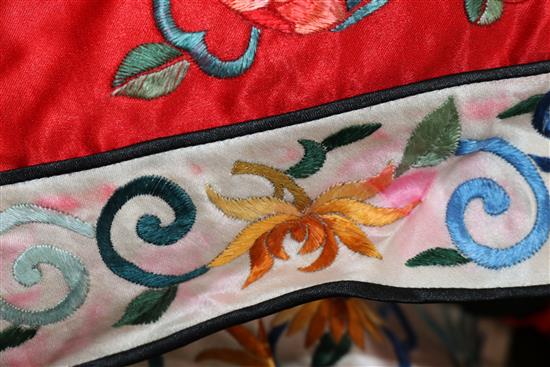 A Chinese embroidered silk and lacework gown